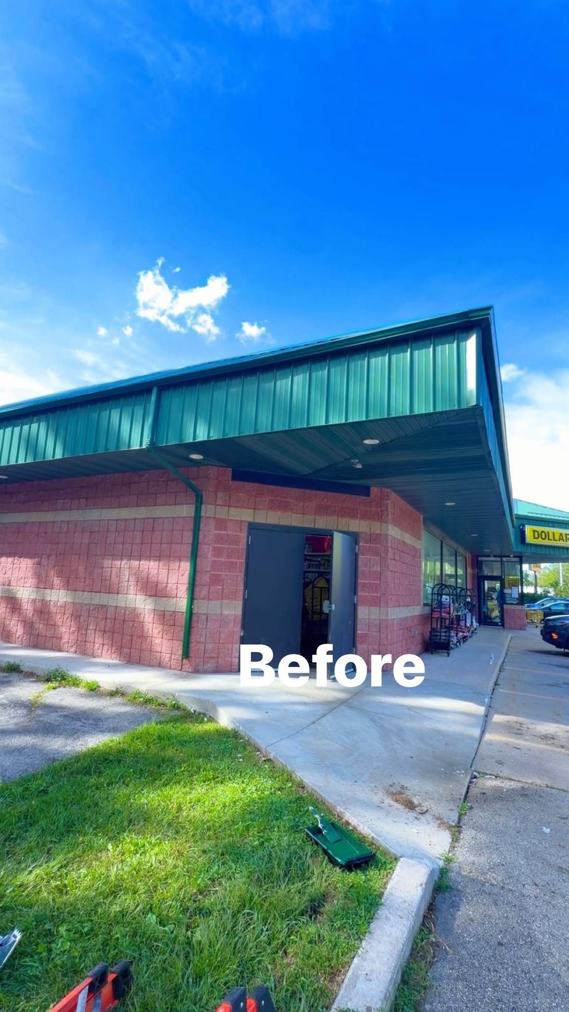Storefront exterior with faded paint before the job